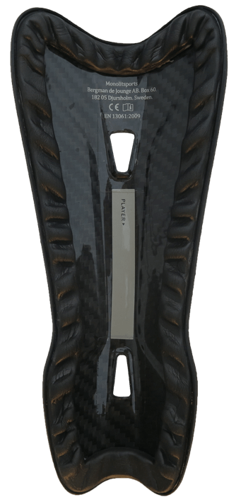 Monolit 19cm Carbon Fibre Shin pads showcasing patented technology for maximum protection and lightweight design.