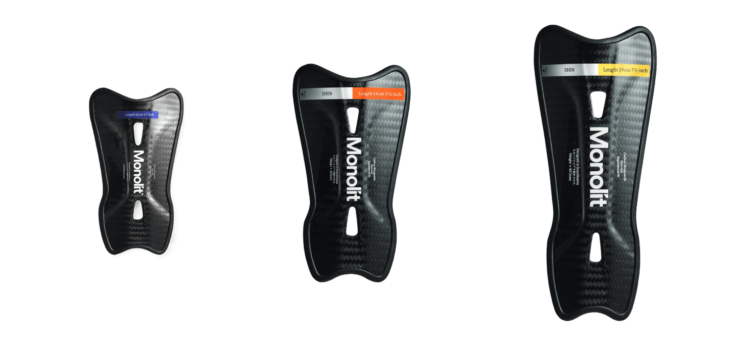 Monolit 14cm Carbon Fibre Shin pads showcasing different sizes and patented technology for enhanced protection.