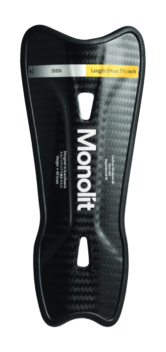 Black shin guard with 'Monolit' branding on a white background